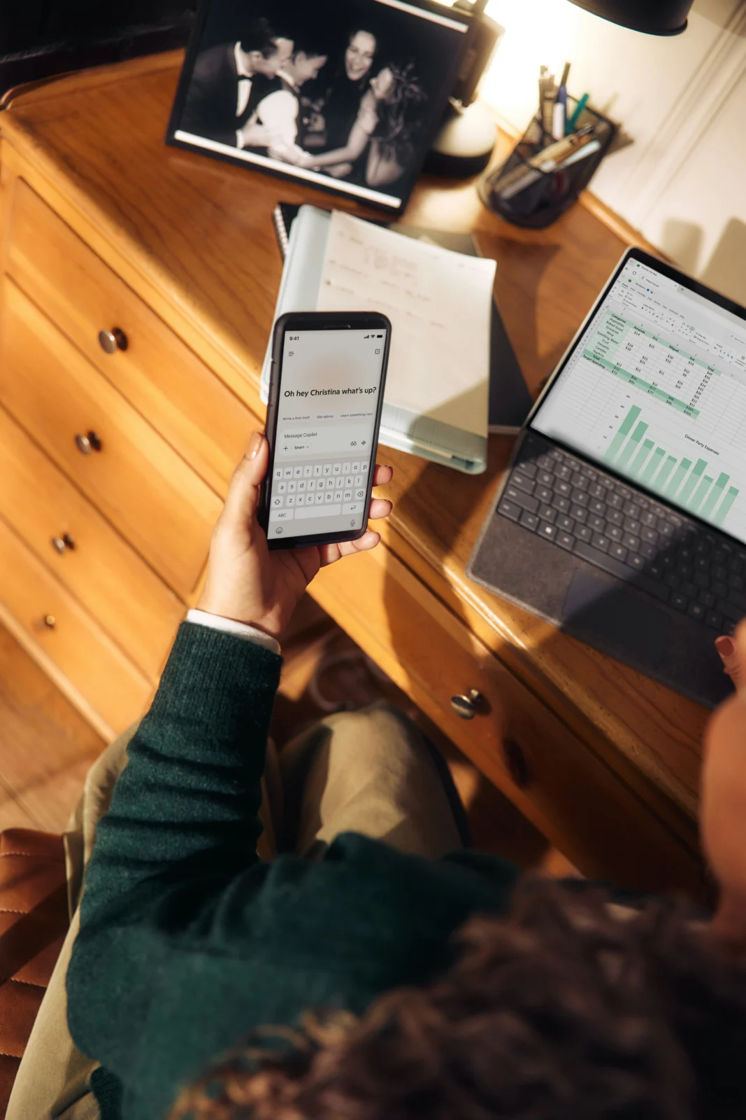 Phone placed away from a workspace during a screen-time reduction routine for better focus