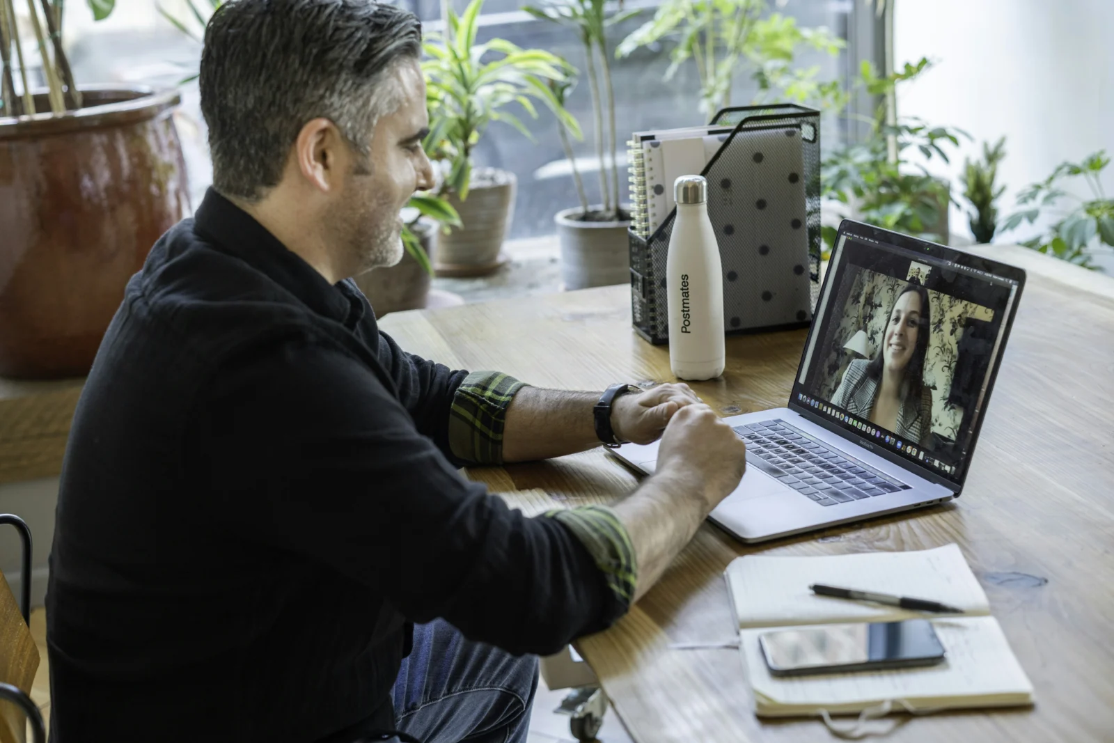 Entrepreneur using virtual networking tips during a focused video coffee chat