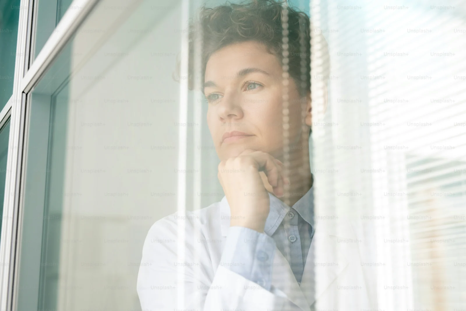 Professional reflecting quietly on the difference between self-worth and self-confidence