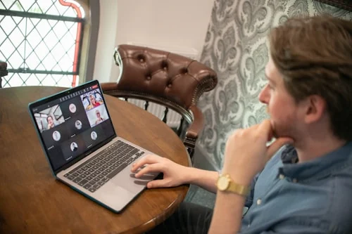Manager on a video call demonstrating how to manage remote teams effectively