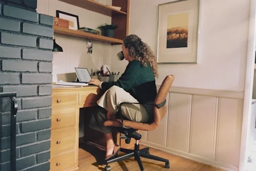 Remote employee working independently, reflecting trust-based remote team management