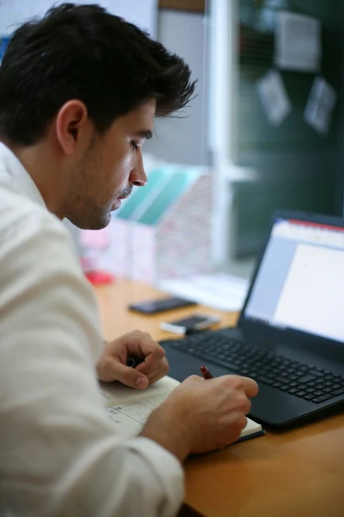 Professional mapping out next steps after recognizing career stalled signs