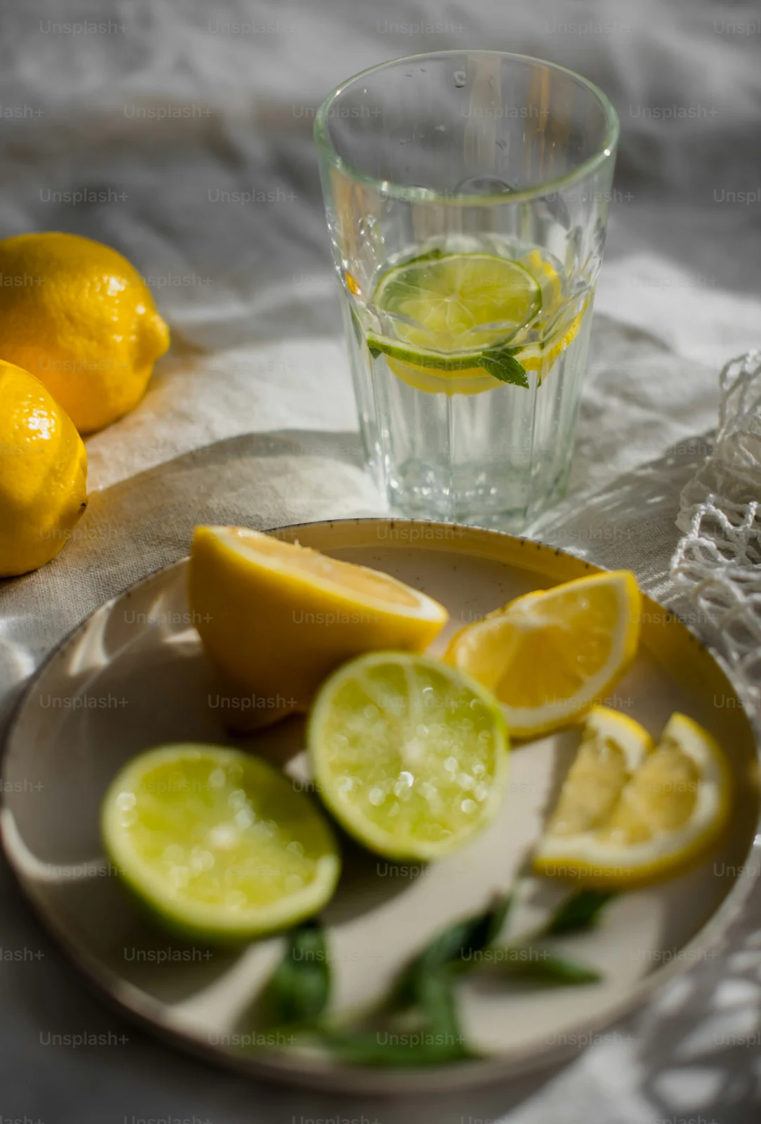 Water and fresh fruit showing different ways to support healthy daily hydration