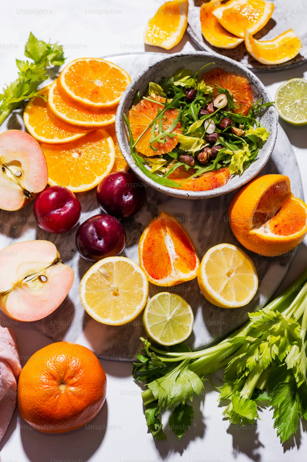 Colorful whole foods including berries and leafy greens among practical everyday superfoods