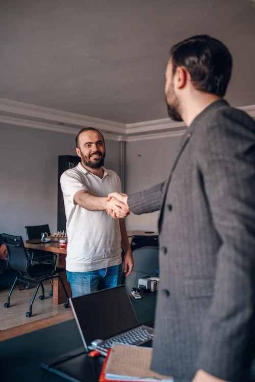 New manager leading first team meeting after individual contributor to manager transition