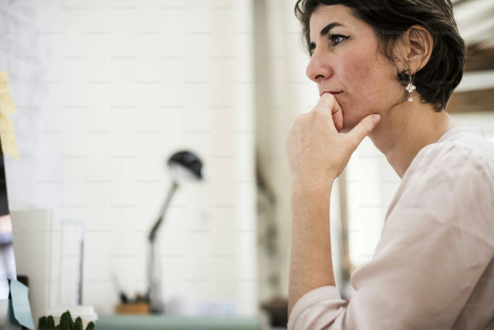 Woman sitting quietly while dealing with fear of change and uncertainty about her next step