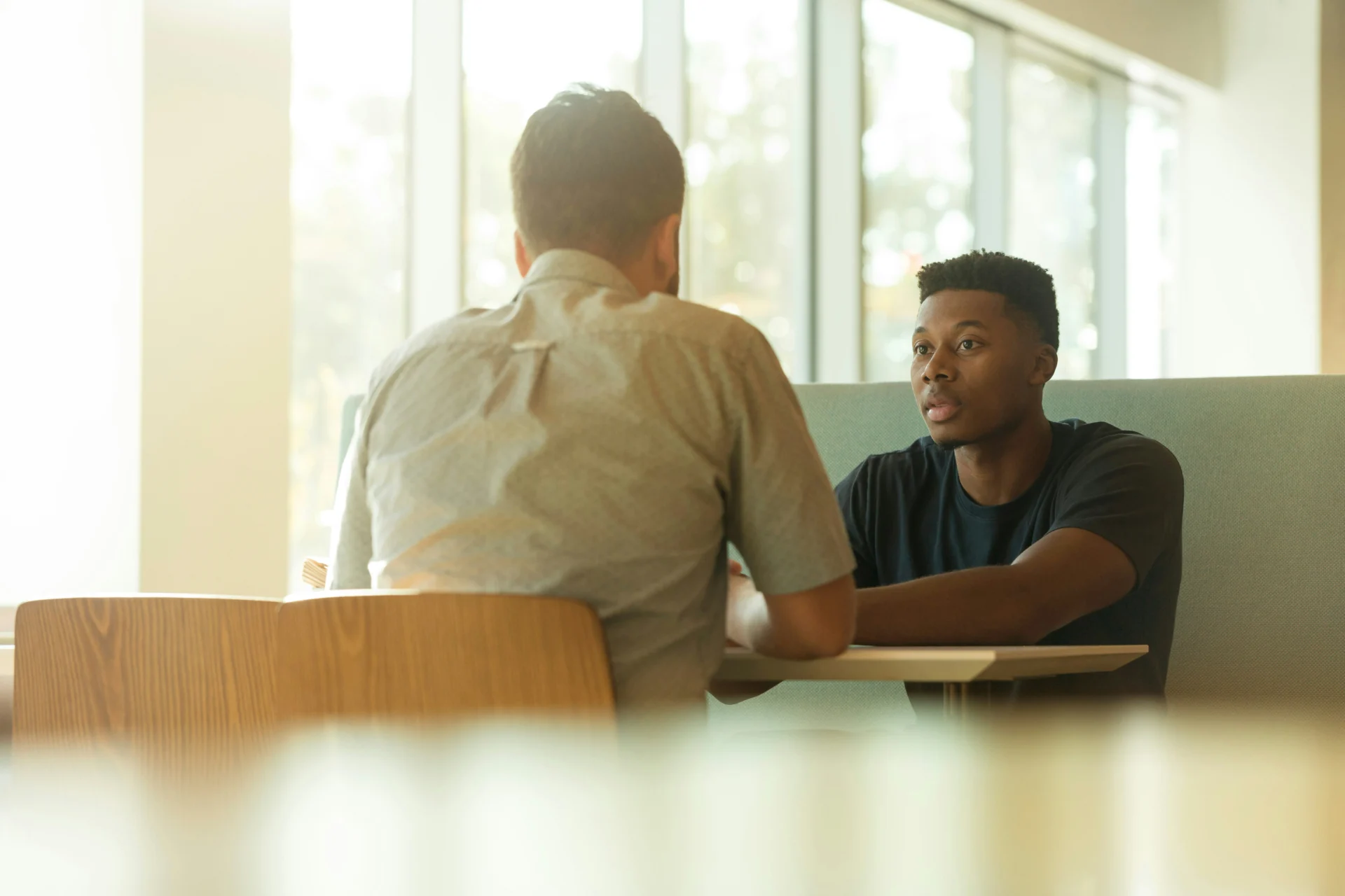 Professional reflecting quietly while recovering from failure after a major career setback